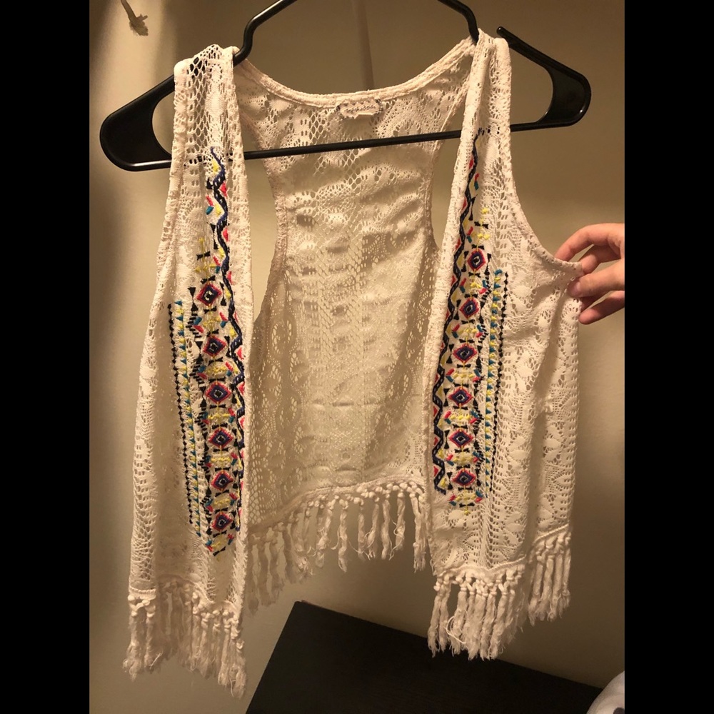 White Bohemian vest with tassels and Aztec print